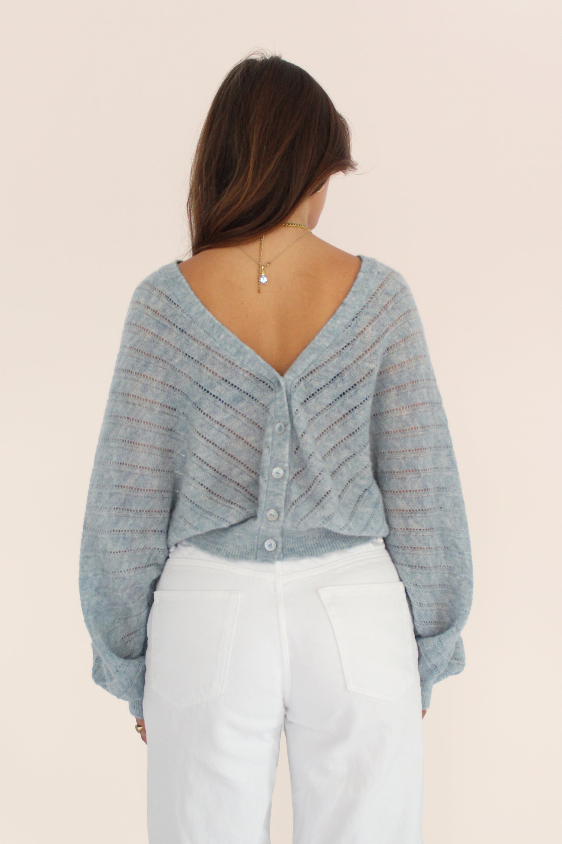 Himmelblaue Strickjacke